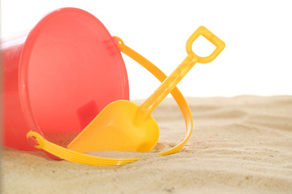 Child's Shovel and Pail at the Beach