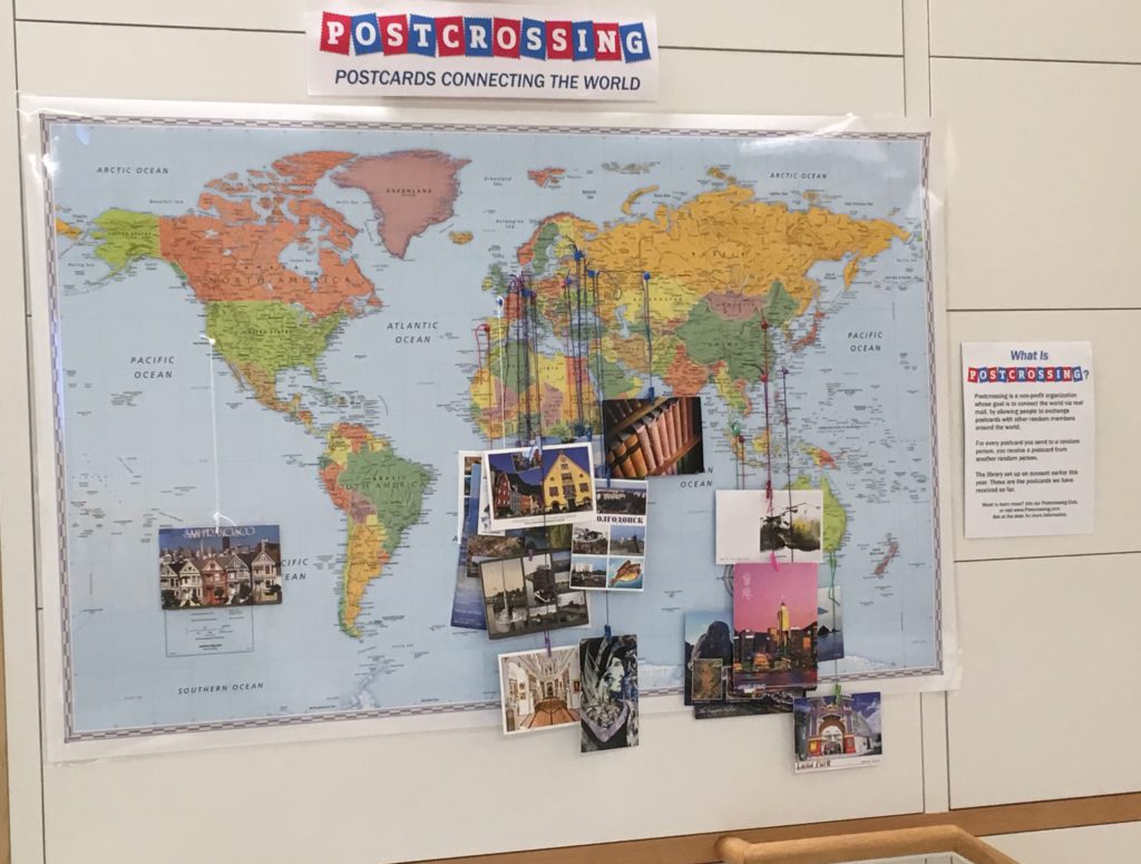 Photo of map with postcard display