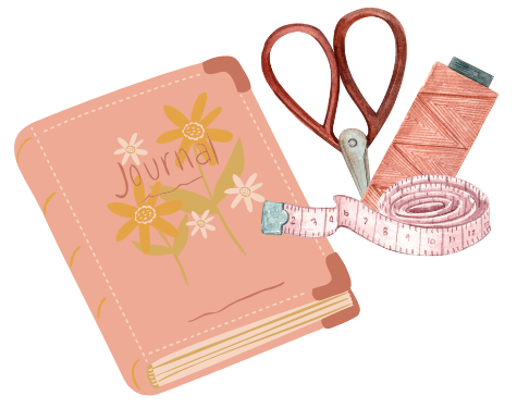 a peach colored journal beside a set of sewing implements