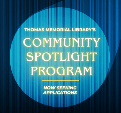 A blue curtain with a bright circle of light with the words "Thomas Memorail Library's Community Spotlight Program, now seeking applications"