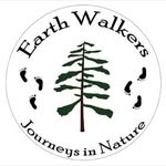 The logo for Earthwalkers, Journeys in Nature featuring a white circle with a green pine tree against a white background, with three green human footprints on each side of the tree